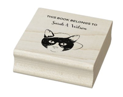 This book belongs to personalized name book rubber stamp, with a cool nerdy cat with a baseball hat
