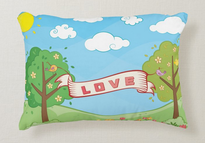 Pillow for kids with trees in summer and birds holding a large LOVE banner