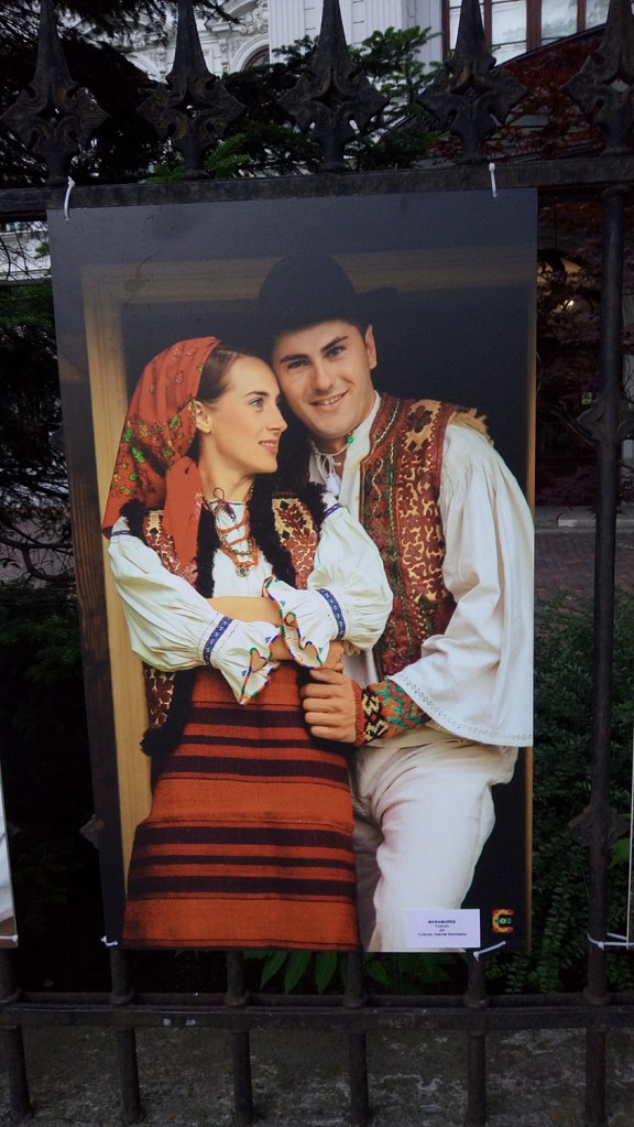 Man and woman dressed in traditional costumes from Maramures, Romania