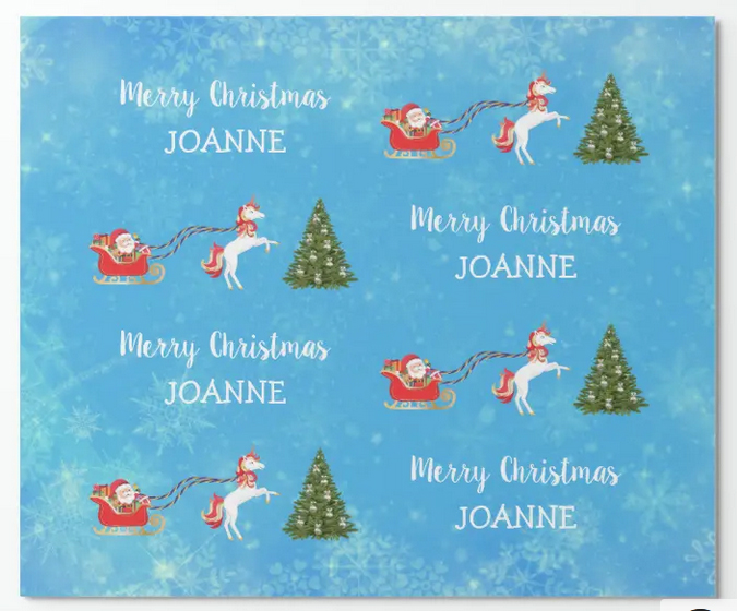 Santa, unicorn, trees, and Merry Christmas on a blue wrapping paper with lots of snow