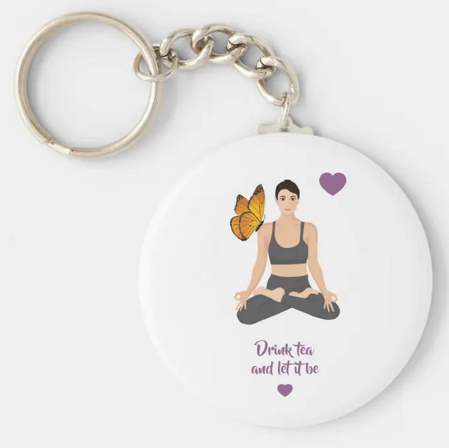 "Drink tea and let it be" quote keychain with a girl in lotus pose with butterfly and hearts