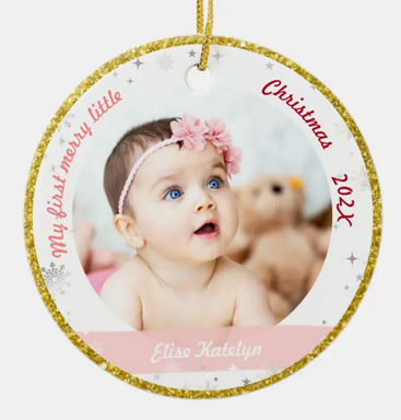 Elegant First Christmas Baby Girl Ornament keepsake, with snowflakes and stars, and a golden frame. Personalize with two photos, name, and date of birth