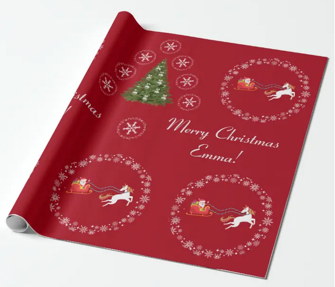 Red Christmas paper with a unicorn pulling Santa's sleigh, a tree with baubles, and lots of snowflakes. Personalize with a name