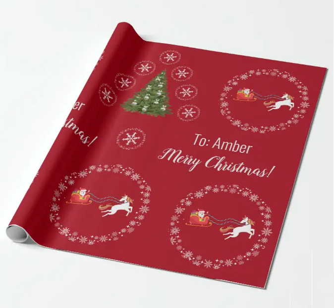 Christmas wrapping paper with Santa, a unicorn, snowflakes, and a personalized name