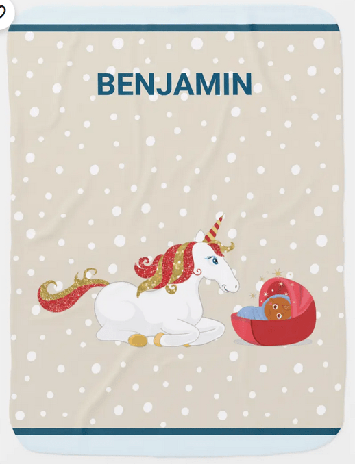 Customized newborn blanket with unicorn for a Brown baby boy; ivory background with white dots and blue edges