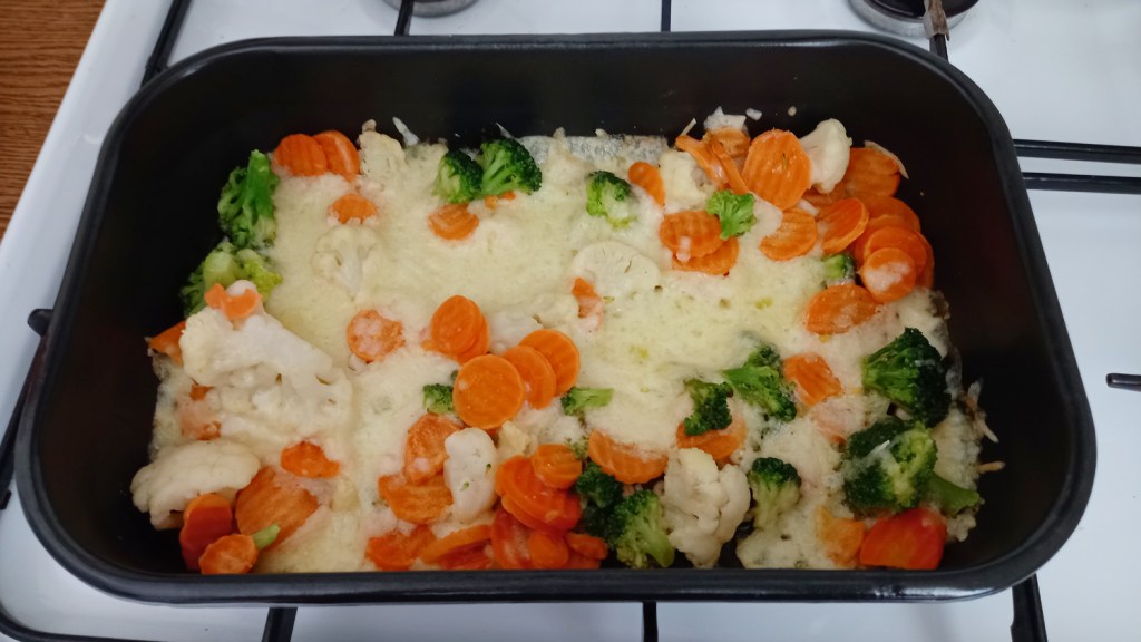 Oven-baked frozen veggies, with mixed shredded cheese and olive oil