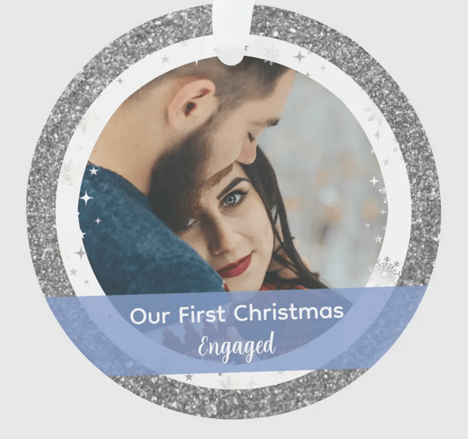 Elegant, modern "Our First Christmas Engaged" ornament, with 2 photos and faux silver glitter