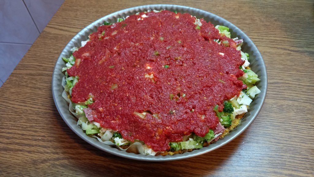 Delicious and Healthy GF Romanian pizza with salami, cheese, and plenty of veggies (and with lots of superfood spices and seeds in the chickpea-flour crust)