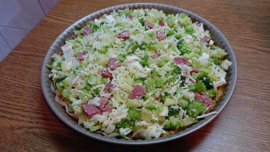 GF Romanian pizza that tastes like comfort food while packing lots of health benefits (consider the chickpea flour, broccoli, seeds and spices, olive oil, etc.)