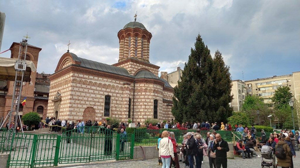 Christian Orthodox worshippers waiting in line at the Church of St. Anthony (Biserica Sf. Anton) in Bucharest's Historic Center