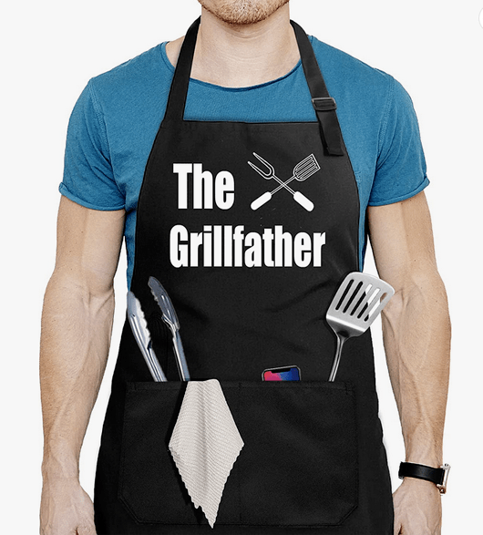 Funny apron for men with pockets for grilling implements and the text The Grillfather