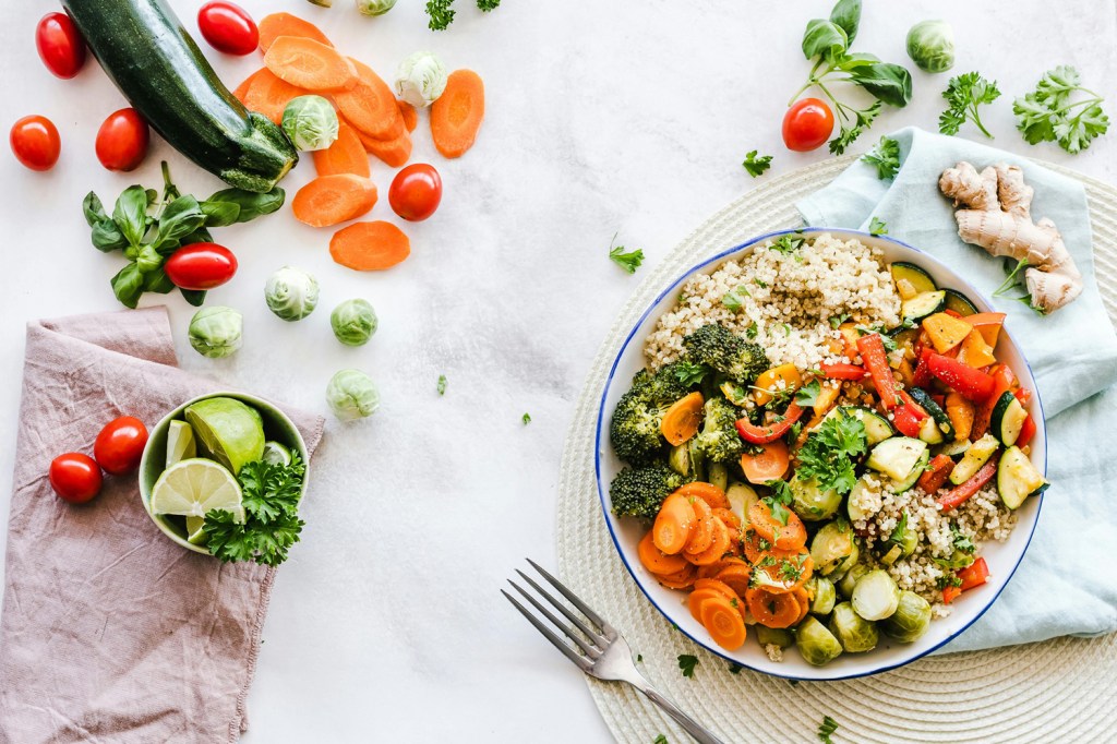 Vegetable salad with carrots, broccoli, zucchini, and other vegetables, and with quinoa