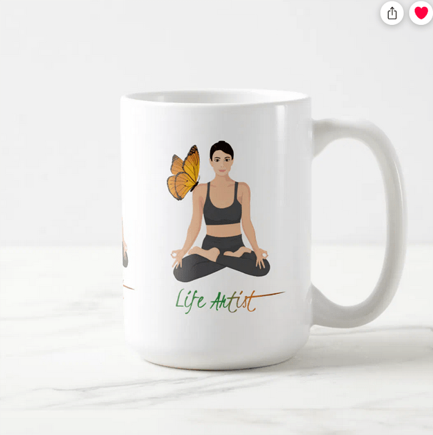 Woman in a yoga pose (she's in the lotus asana) with a butterfly on her shoulder. Coffee mug with the inspirational slogan "Life Artist"