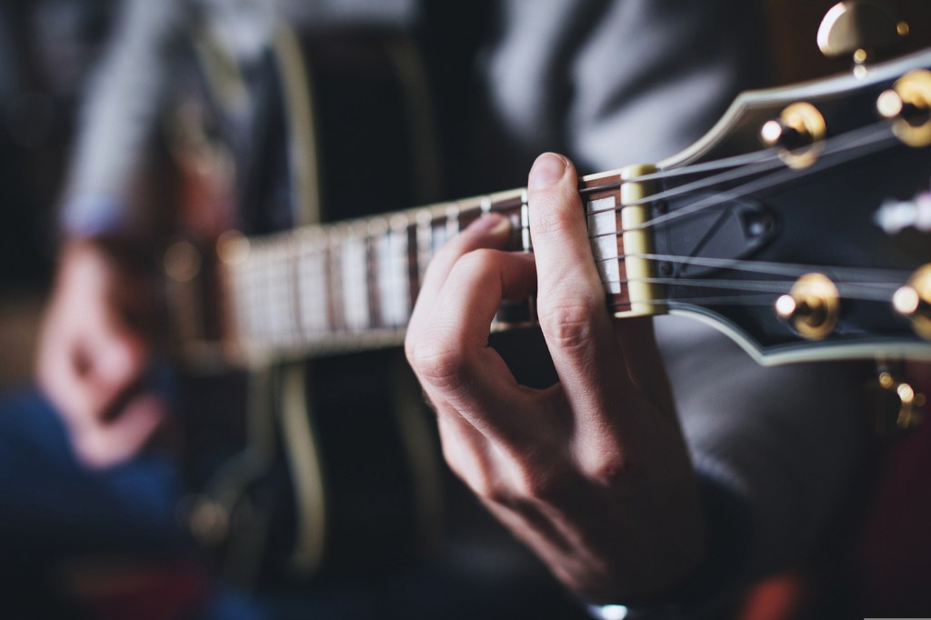 Musician playing guitar